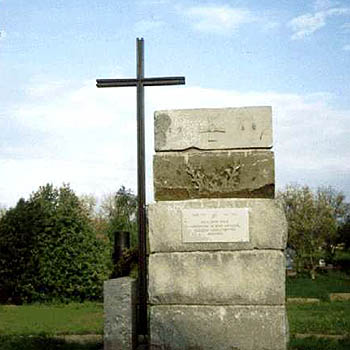 1990's. Memorial cross near the church