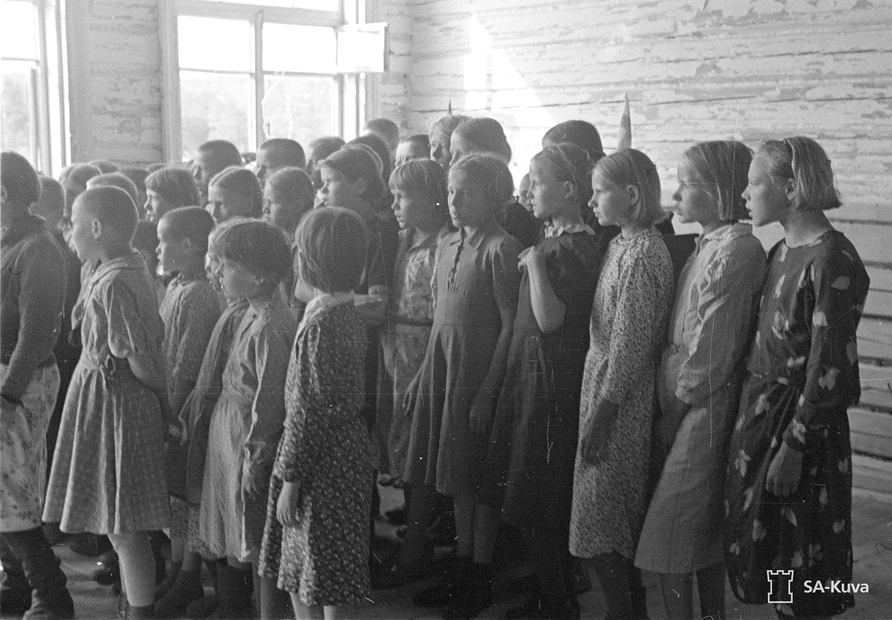 July 15, 1942. Students of the Popular School singing
