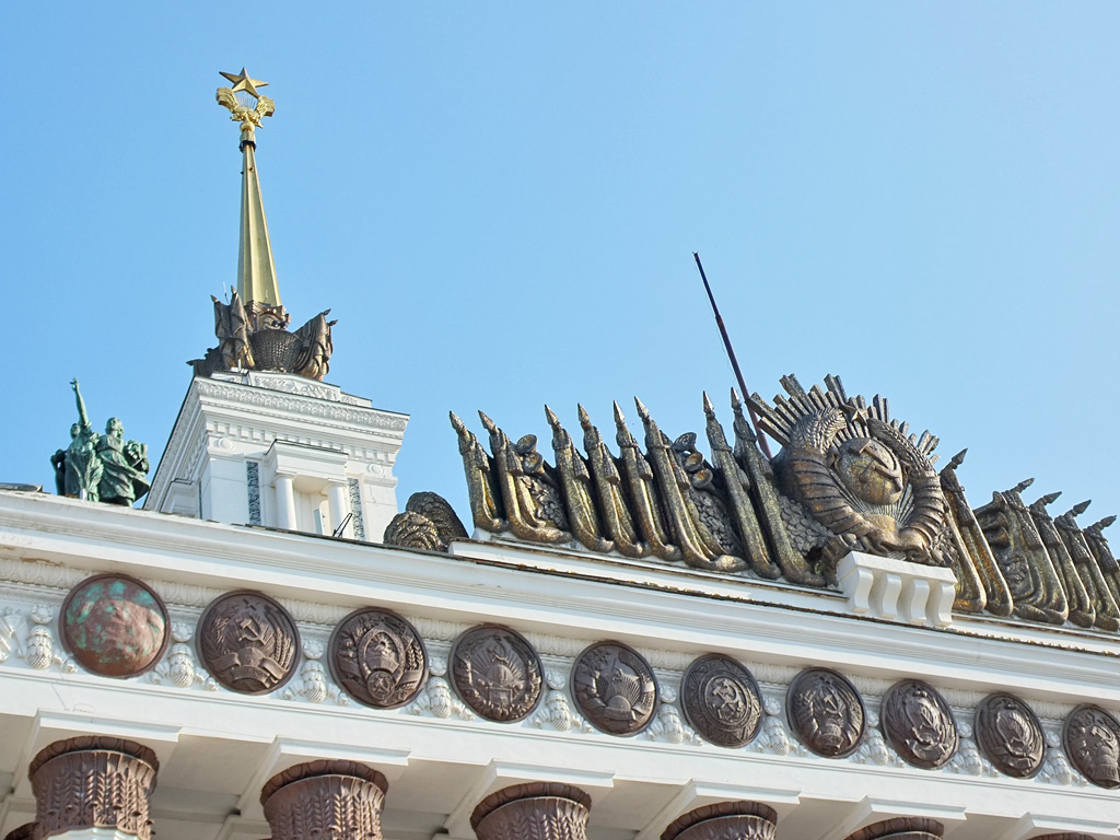 September 15, 2012. The Coat of Arms of the Karelian-Finnish SSR in the Central Pavilion of the All-Russia Exhibition Centre, facade from the side of the Friendship of Nations Fountain