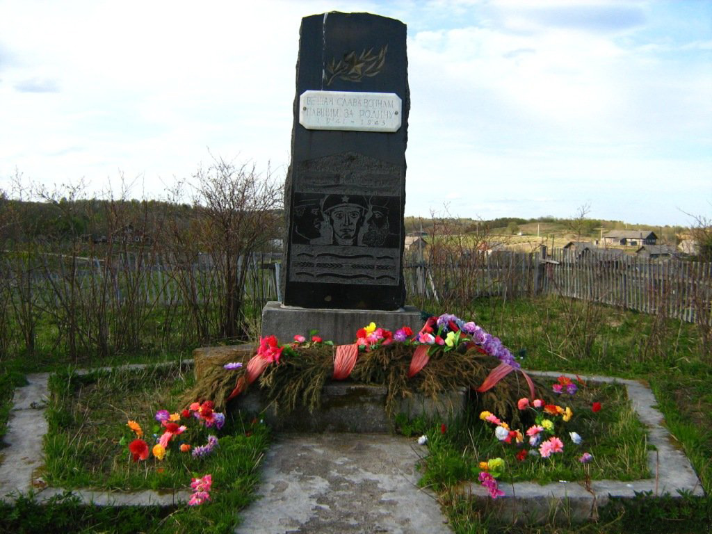 Early 2000's. Veshkelitsa. The common grave of the Soviet soldiers